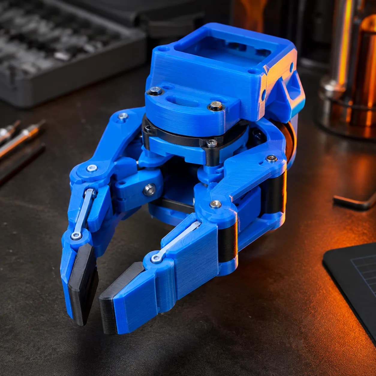 Blue articulated 3D printed robotic gripper